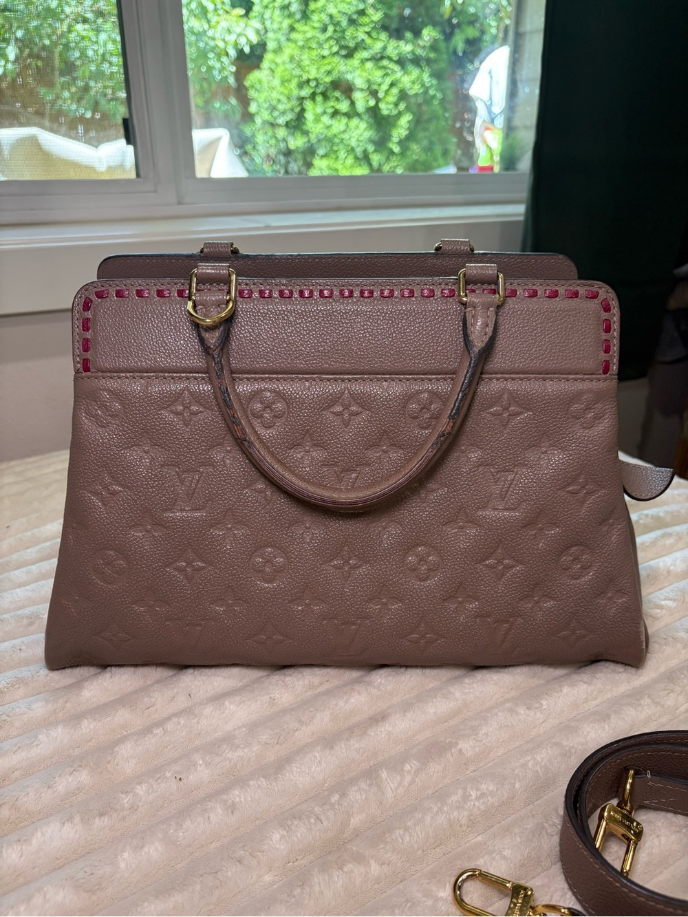 Louis Vuitton Vosges MM bag in taupe monogram Empreinte leather